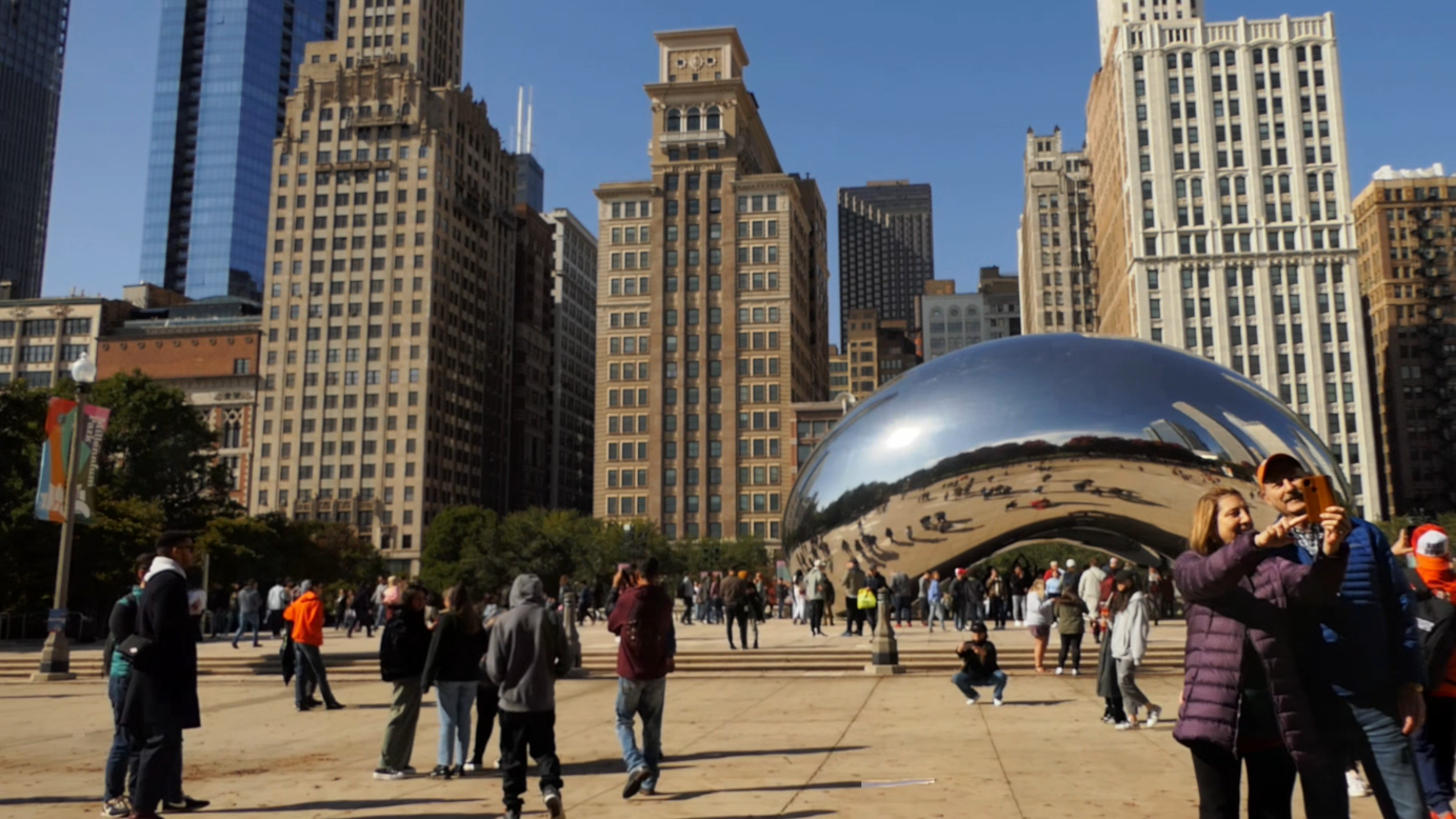 Extremely Slow Pan & Time Lapse Of Crowds Zipping Around The Chicago Bean Video