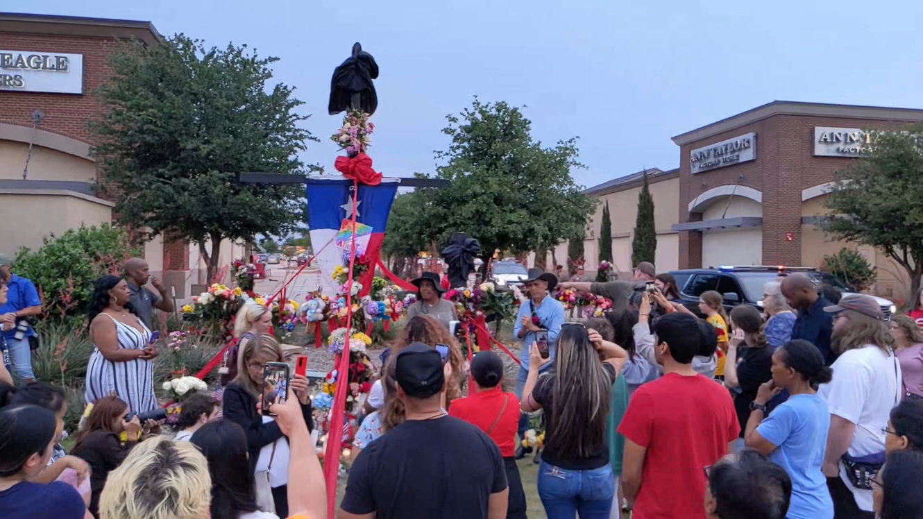 Woman tells vigil "Enough is Enough" at memorial at Allen, Texas Premium Outlets